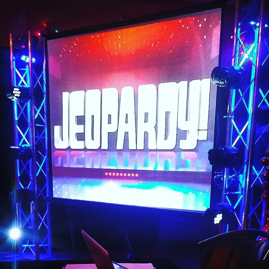 A live Fat City trivia night, screen up and the room locked in